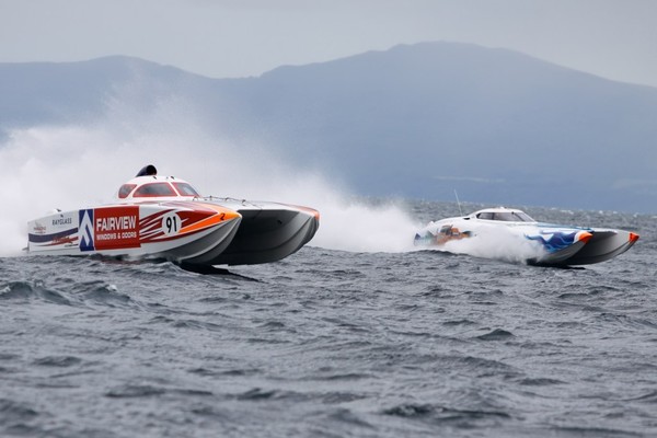 'Doosan' and 'Fairview Windows and Doors' battling during the opening round in Taupo on 31 January.